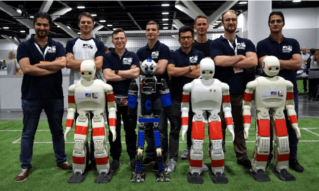 Figure 1 for RoboCup 2019 AdultSize Winner NimbRo: Deep Learning Perception, In-Walk Kick, Push Recovery, and Team Play Capabilities