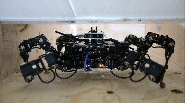 Figure 1 for Walking Posture Adaptation for Legged Robot Navigation in Confined Spaces