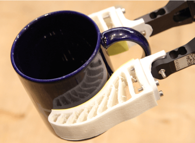 Figure 1 for Non-Planar Frictional Surface Contacts: Modeling and Application to Grasping