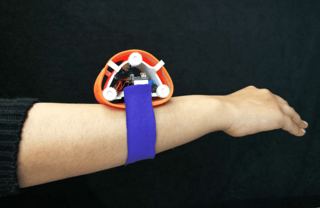 Figure 1 for Characterization of a Meso-Scale Wearable Robot for Bathing Assistance