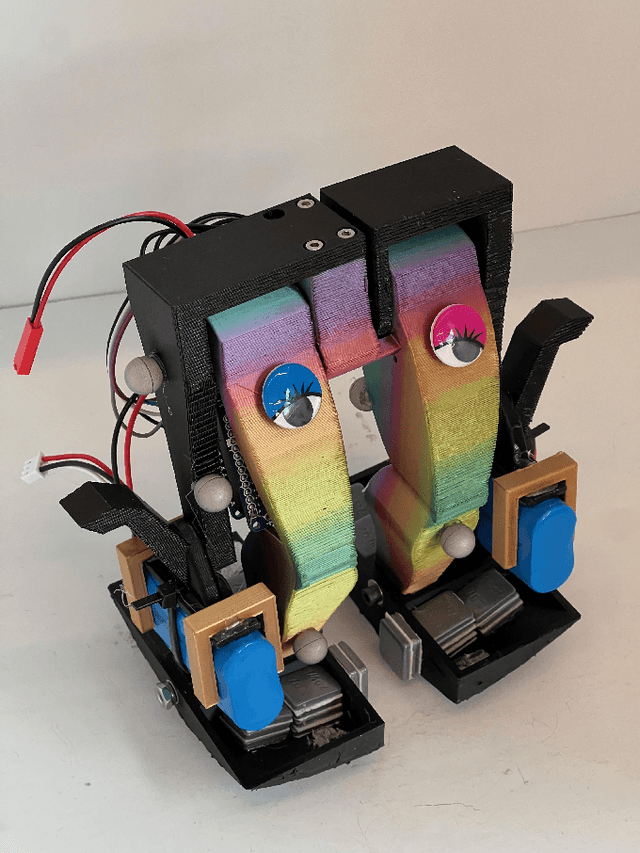 Figure 1 for The Simplest Walking Robot: A bipedal robot with one actuator and two rigid bodies
